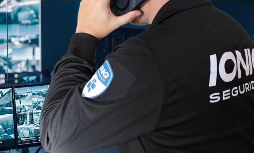 Two Digital Computer Screens with Surveillance CCTV Video in a Harbour Monitoring Center with Multiple Cameras on a Big Digital Screen. Employees Sit in Front of Displays with Big Data